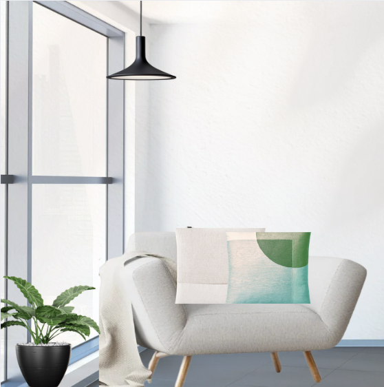 Neutral couch with a teal-and-green abstract print and a potted plant by a bright window In modern therapy office