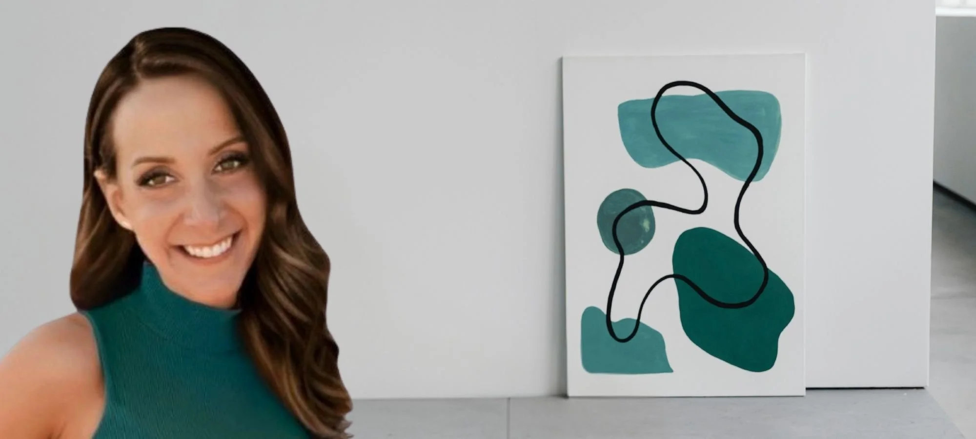 Profile photo of Alexis Verbin, LCSW, LICSW, therapist and owner of Wellcore Healing standing next to an abstract painting