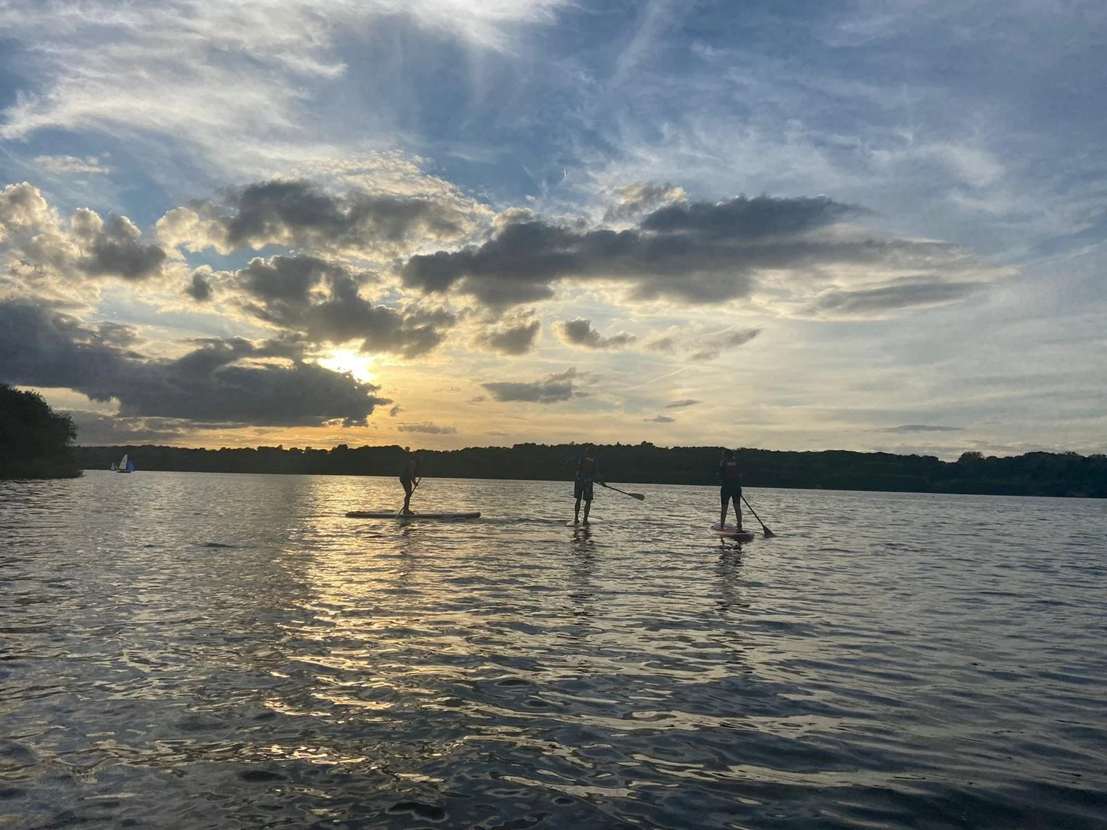 SUP_&_Soul_3_paddlers_paddling_on_reservoir_sunset.jpg