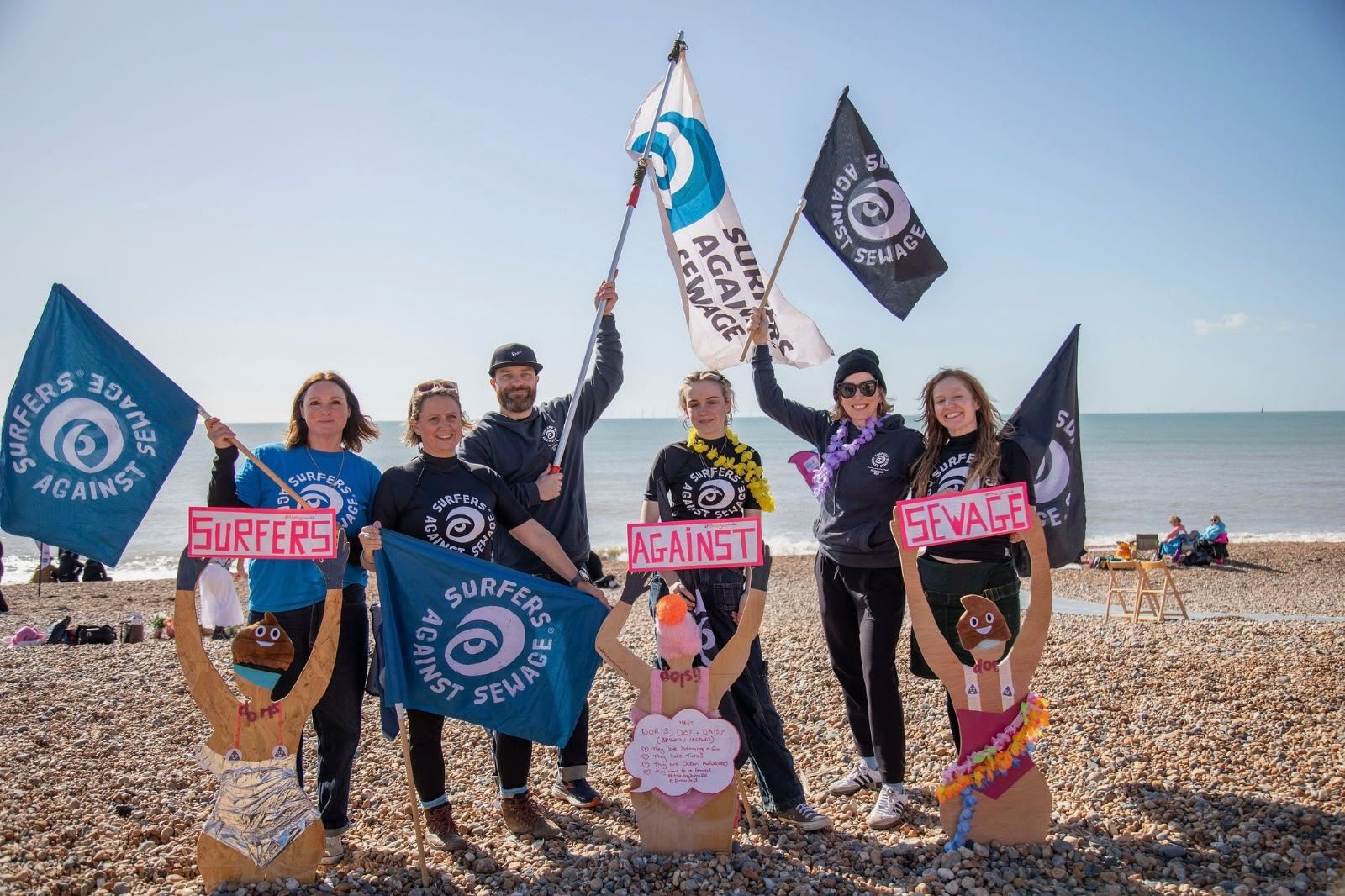 Clare-surfers-against-sewage-paddle-out-protest-brighton-beach.jpeg