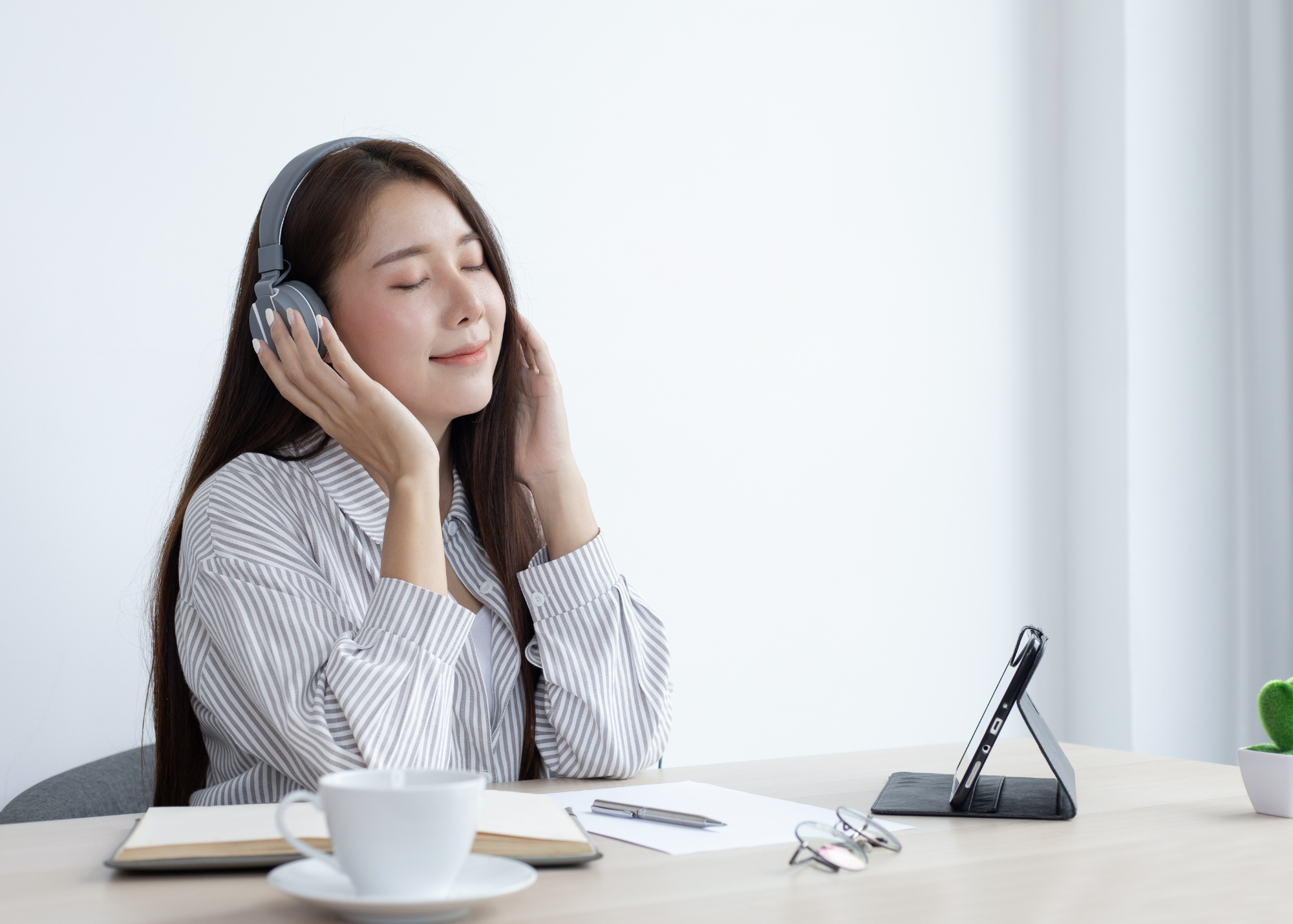 calmpak relaxed woman headphones.png