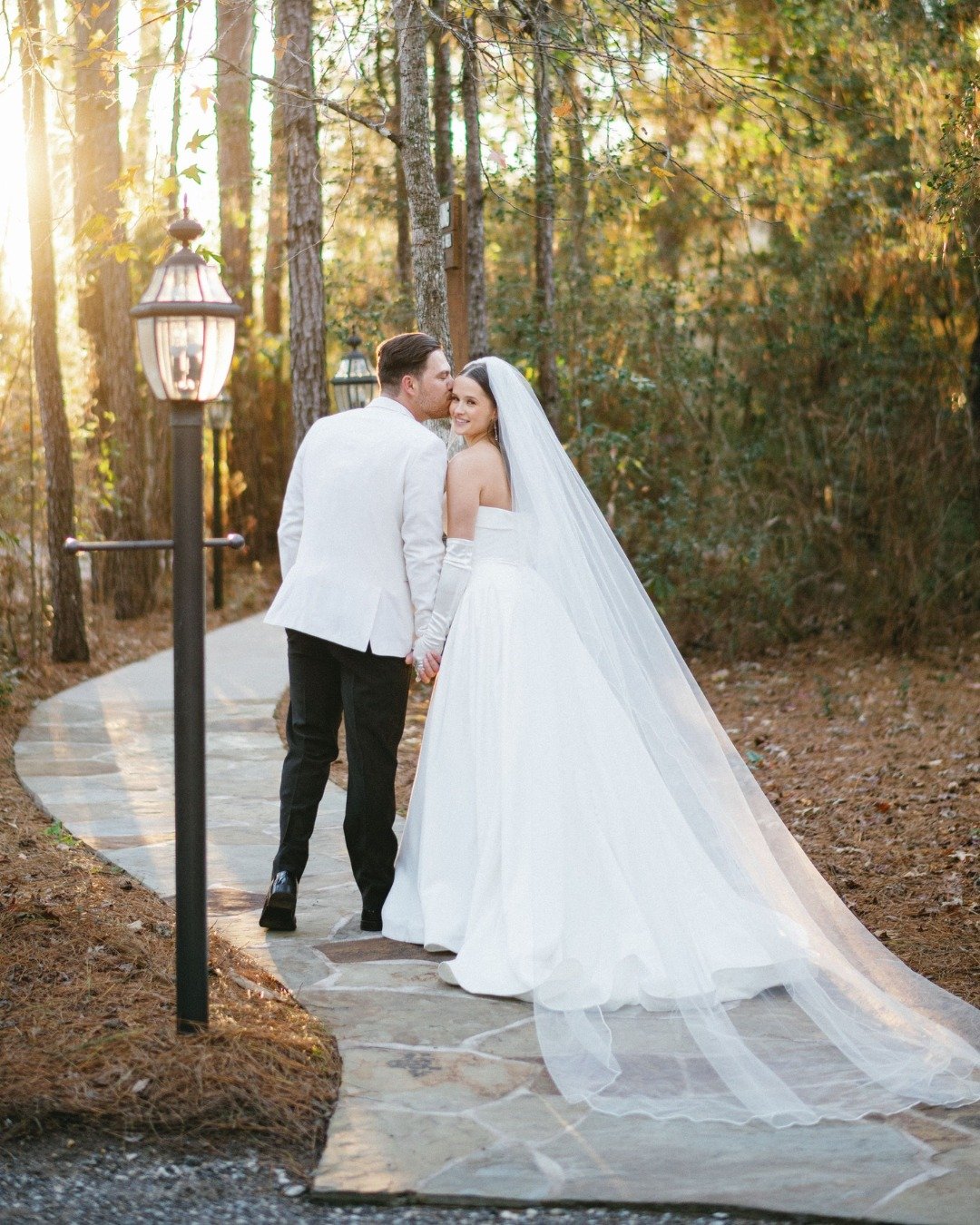 Dreamy winter wedding moments among the trees 🤍

📷 @shelbydayphotography 
👰🤵 @abby_lenttt &amp; @jacobl5 
💄 @tsgfaces 
💇&zwj;♀️ @eastshoresalon 
Magnolia Bells Gold Package

More vendors from this magical winter wedding:
Caterer: @catering_by_a