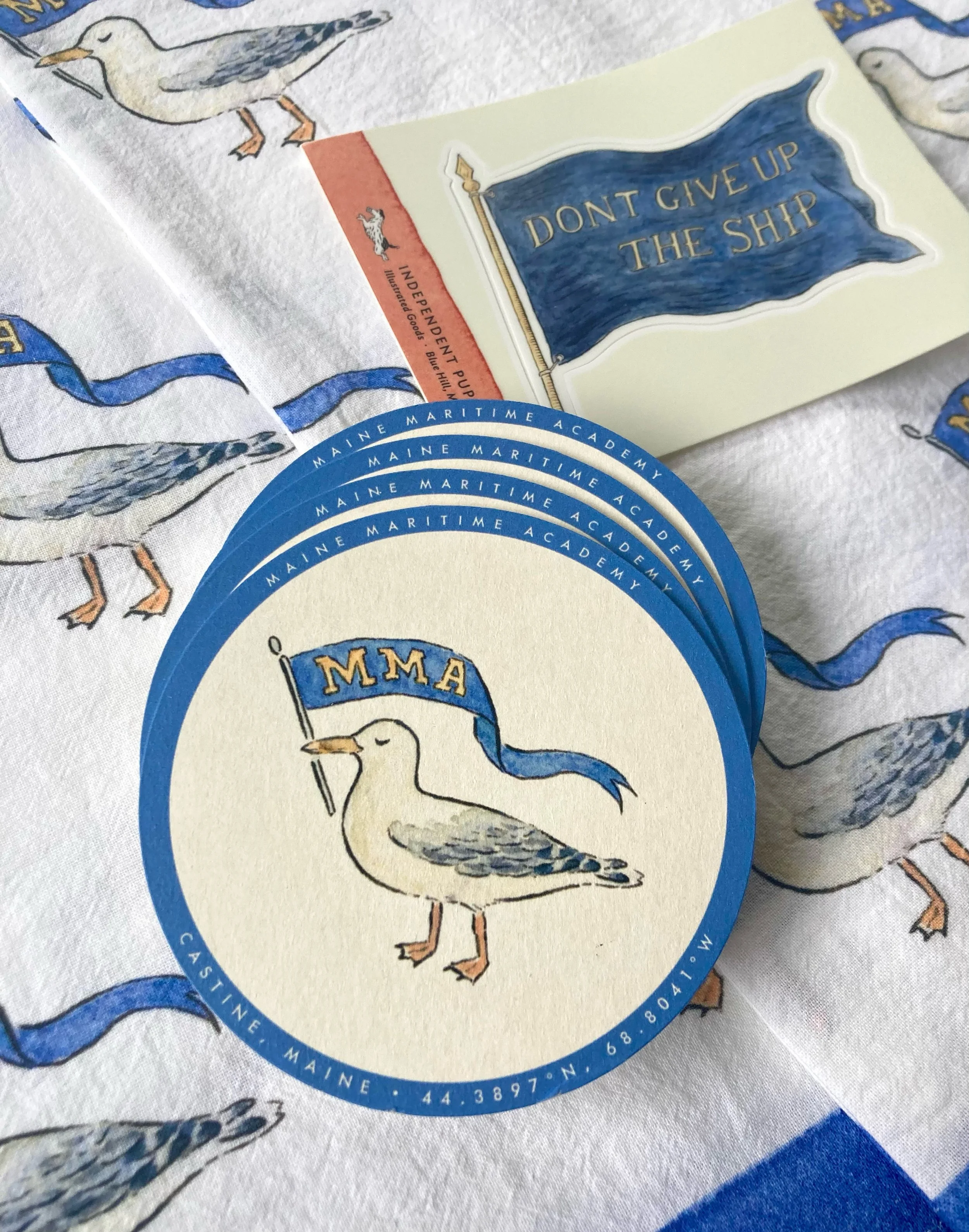 More MMA merch from our very favorite design studio, @independentpuppy_studio , has flown in on a windy fall morning! 🤗  We've missed you all and are back in the shop, tues-sat from 9 to 4 with this cute little seagull and all the usual warm, fun th