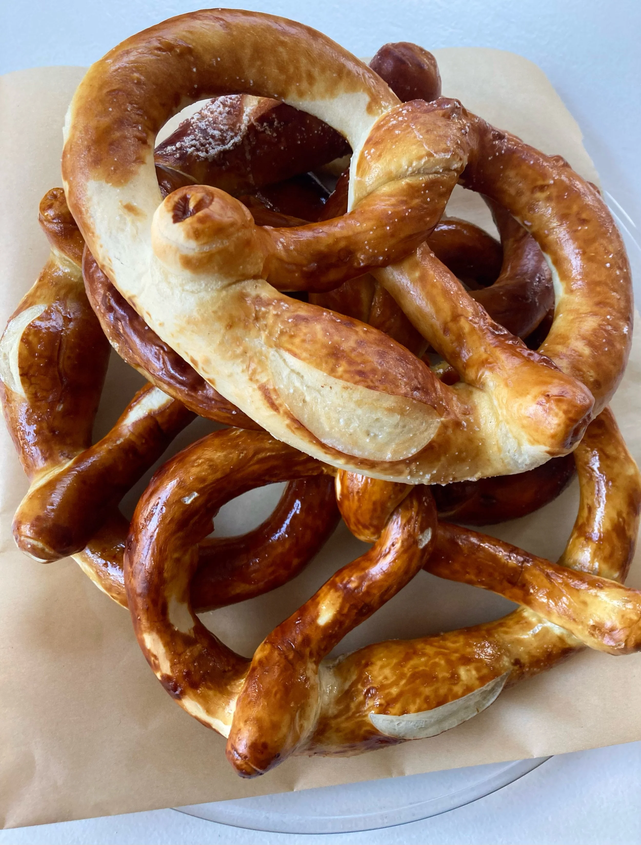 The pretzel as we know it has been around since the 6th century, when monks in the Alpine regions of northern Italy and southern Germany began twisting their bread dough into a knot to represent the Holy Trinity.  Salted, twisted ropes of bread, call