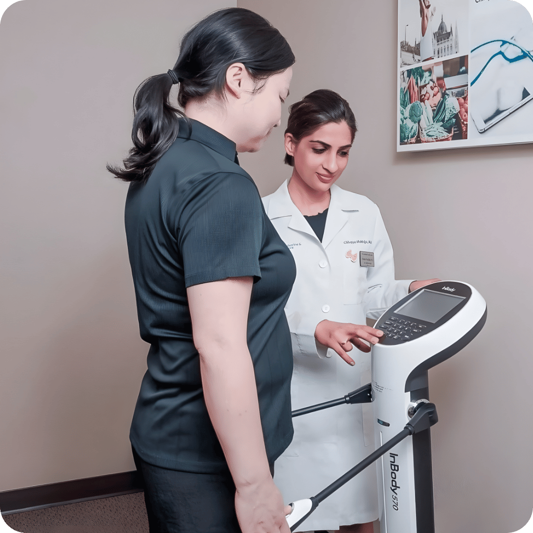 Patient completing body composition analysis with endocrinologist for weight loss and metabolic assessment