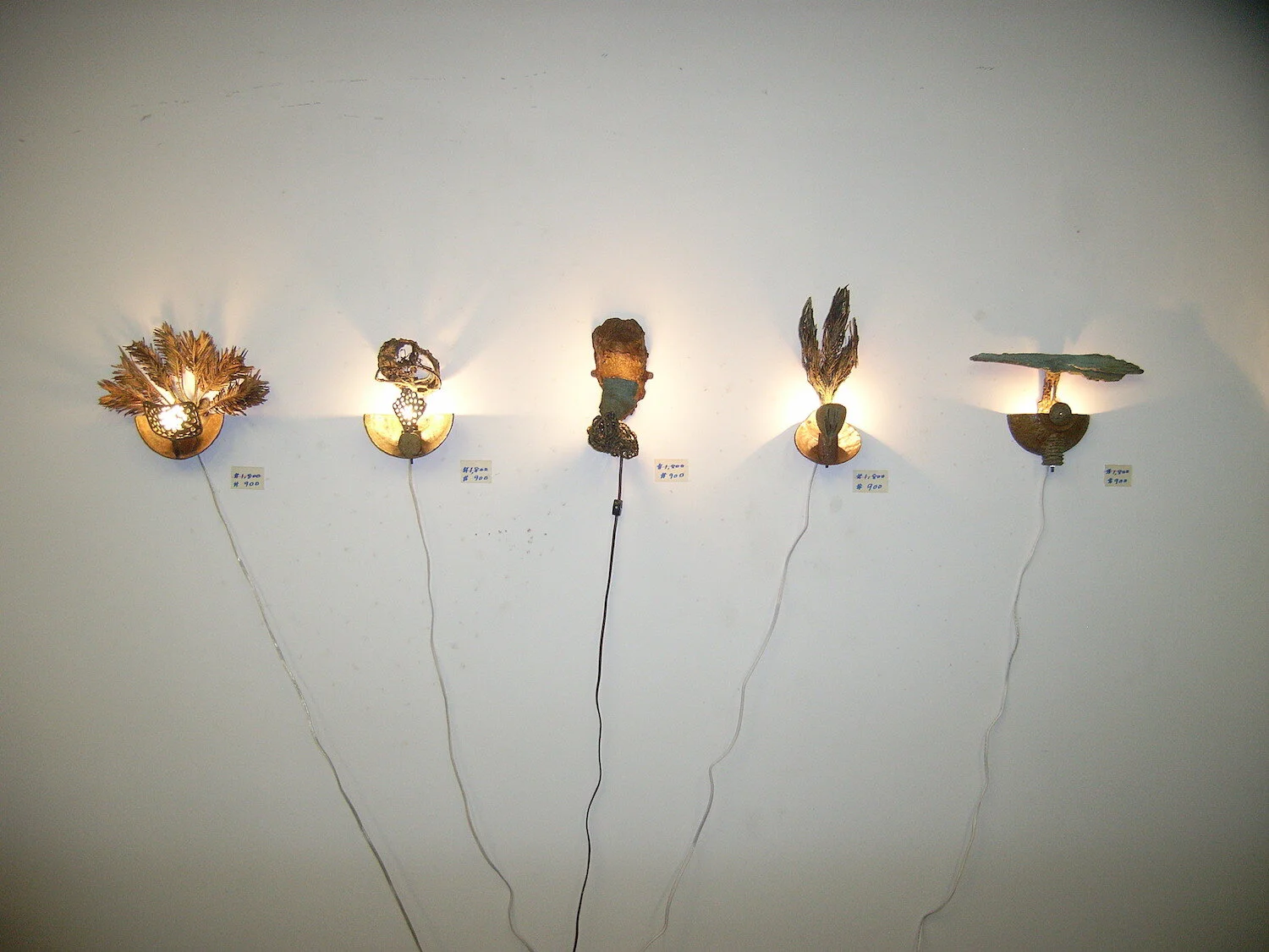 Seriese of bronze wall sconces