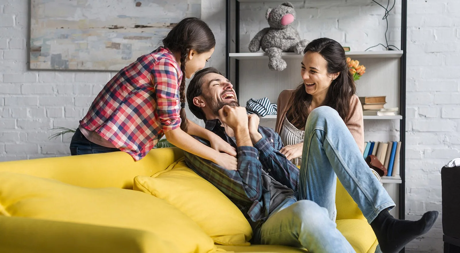 A happy family of 3 using Scently at home.