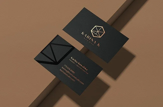 black business card with gold foil