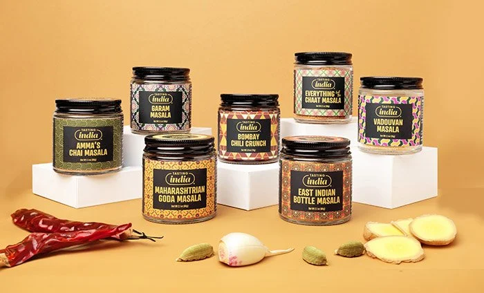 seven Indian spice jars and label redesign