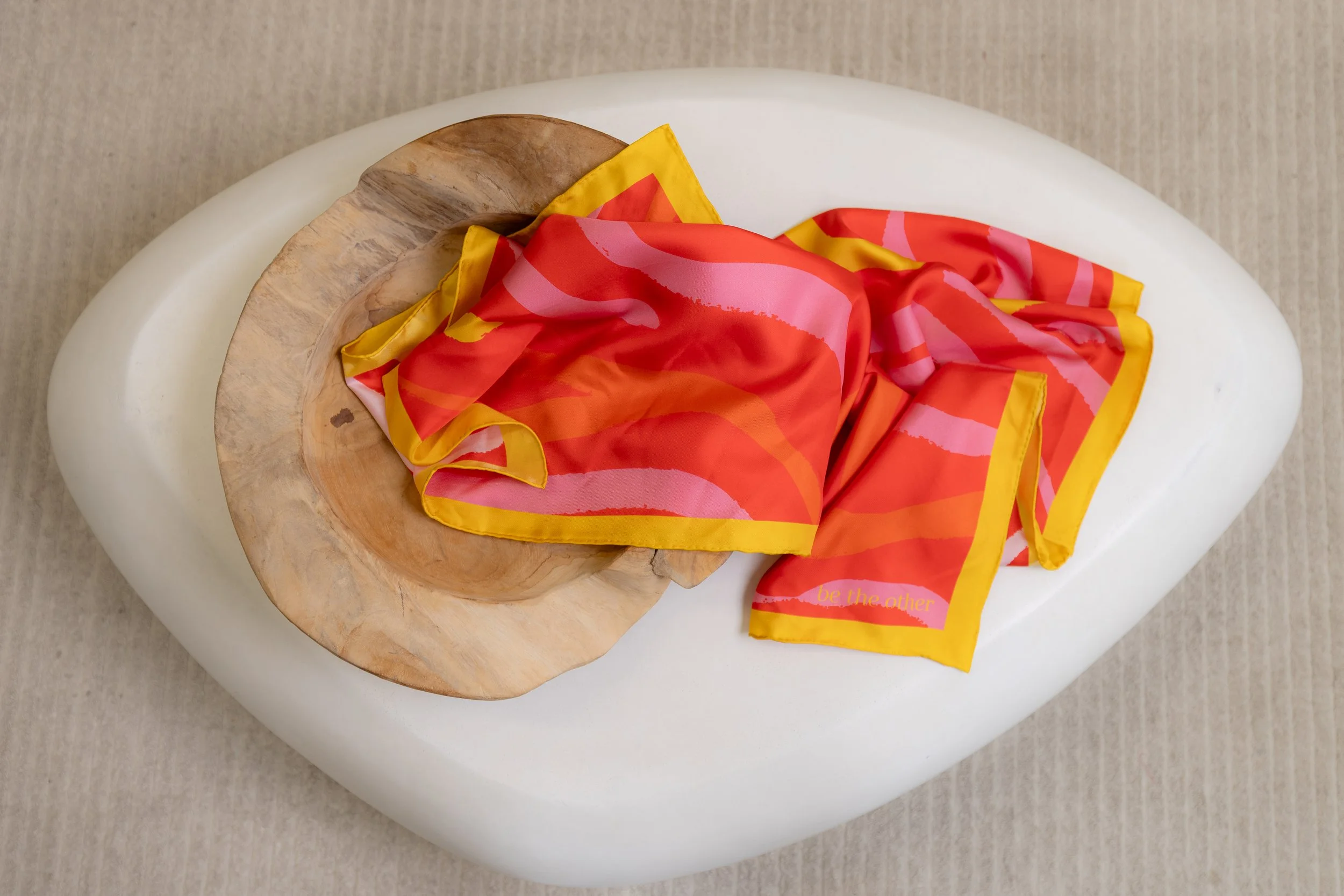 Be The Other birds eye view of red silk scarf