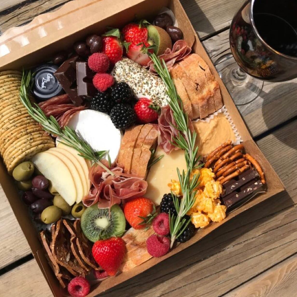 Charcuterie boxes great idea for a gift or potluck. Way more fun and delicious too call to place orders 605-515-0474