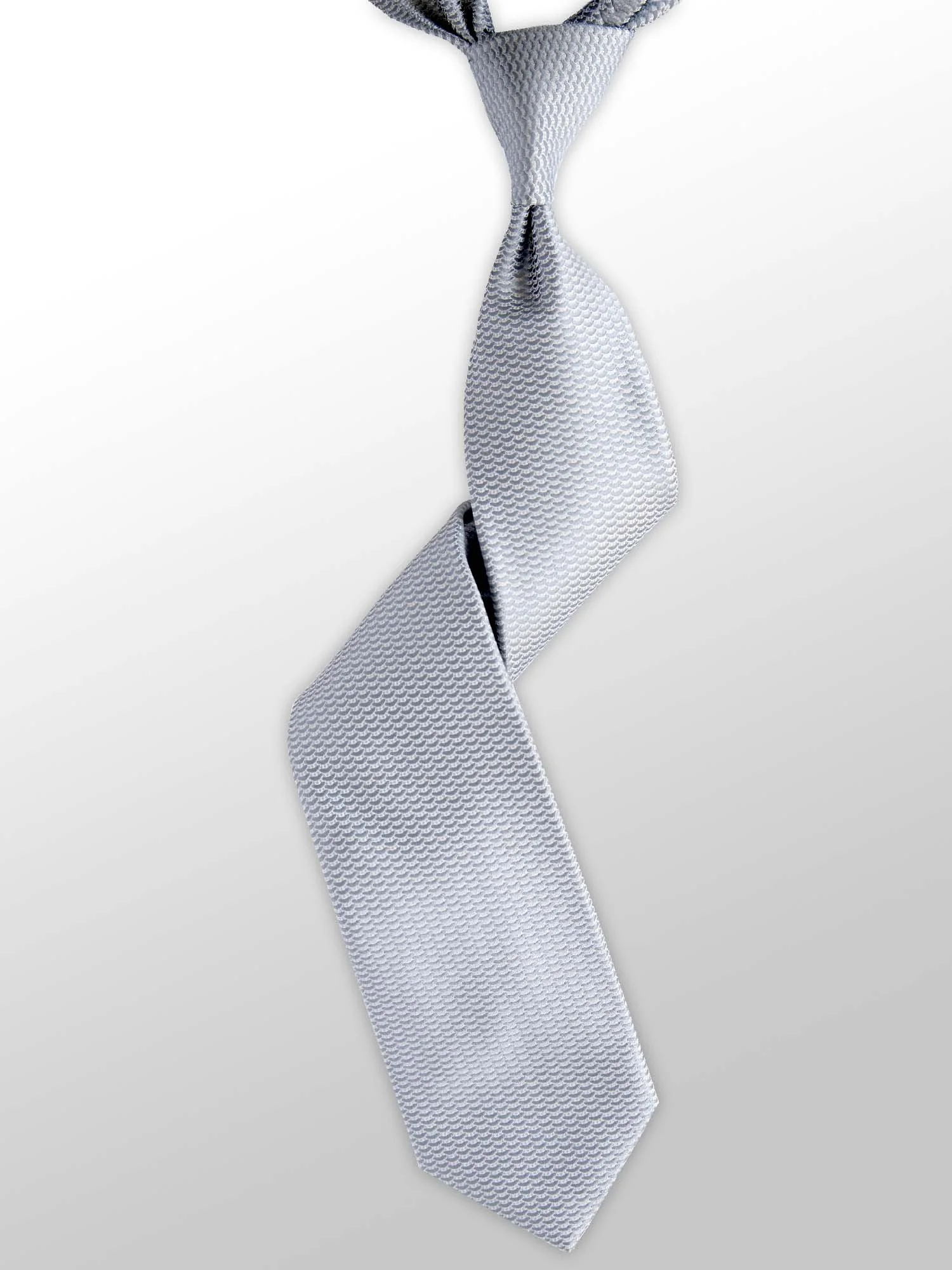 A light gray tie with a textured pattern, knotted and hanging against a white background.