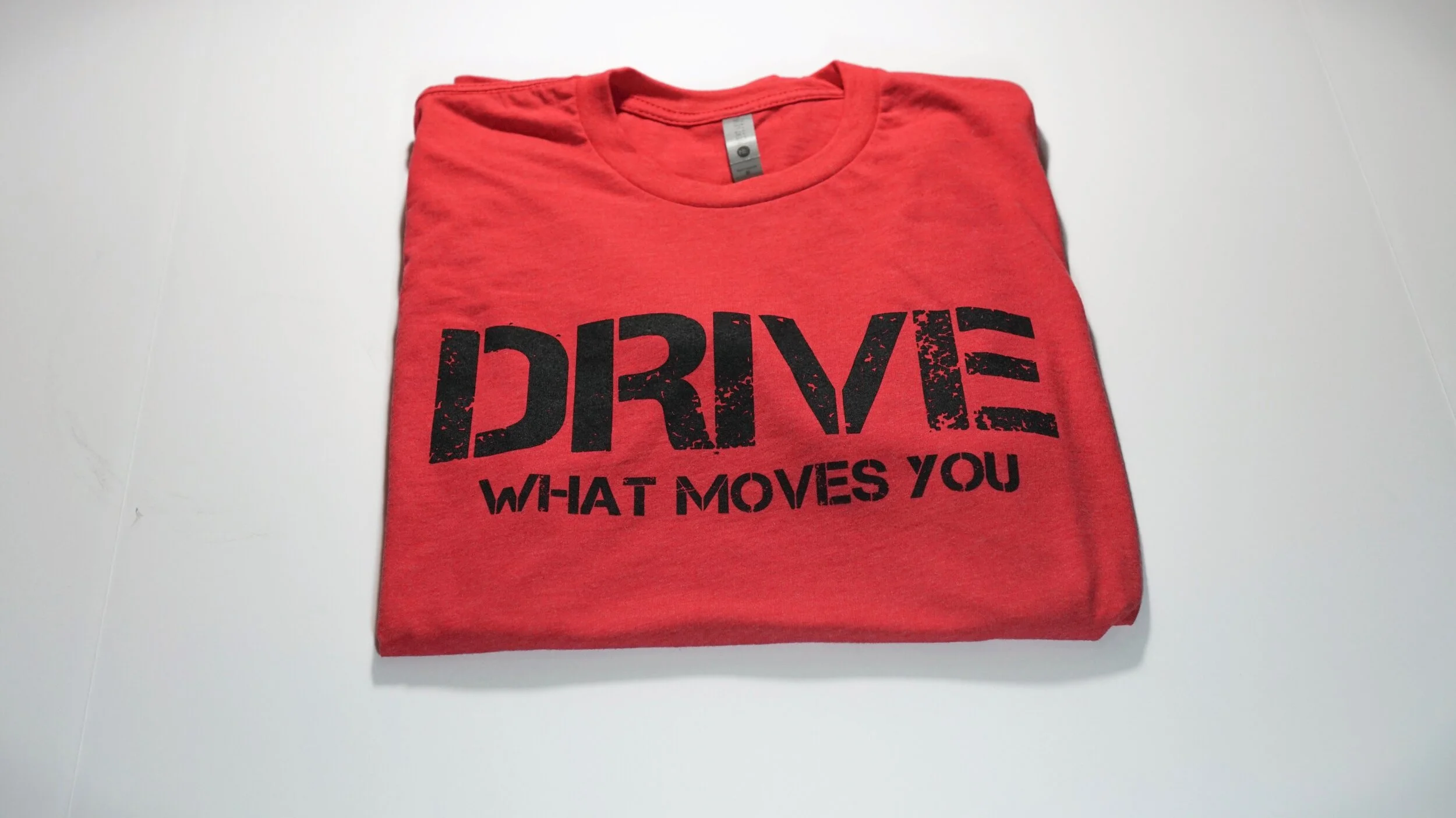"drive what moves you" inspirational tee shirt "Black" logo
