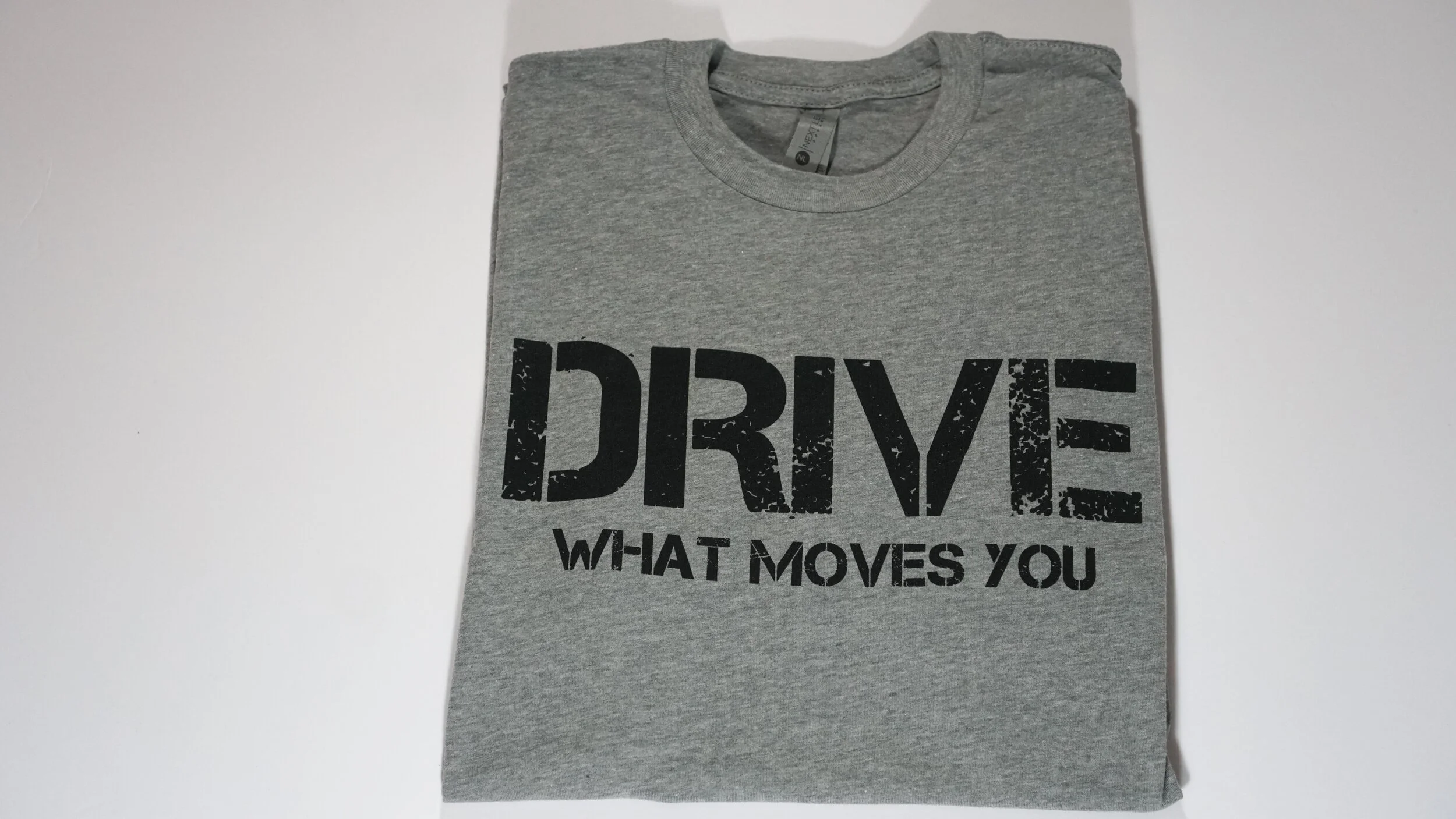 "drive what moves you" inspirational tee shirt "Black" logo