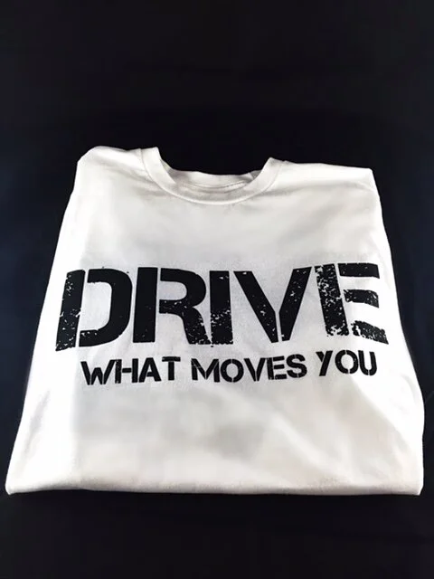 "drive what moves you" inspirational tee shirt with "black" logo