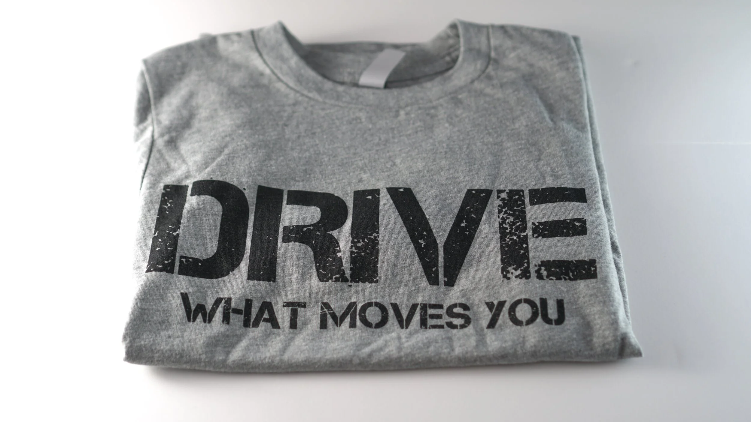 "drive what moves you" YOUTH inspirational tee shirt "BLACK" logo