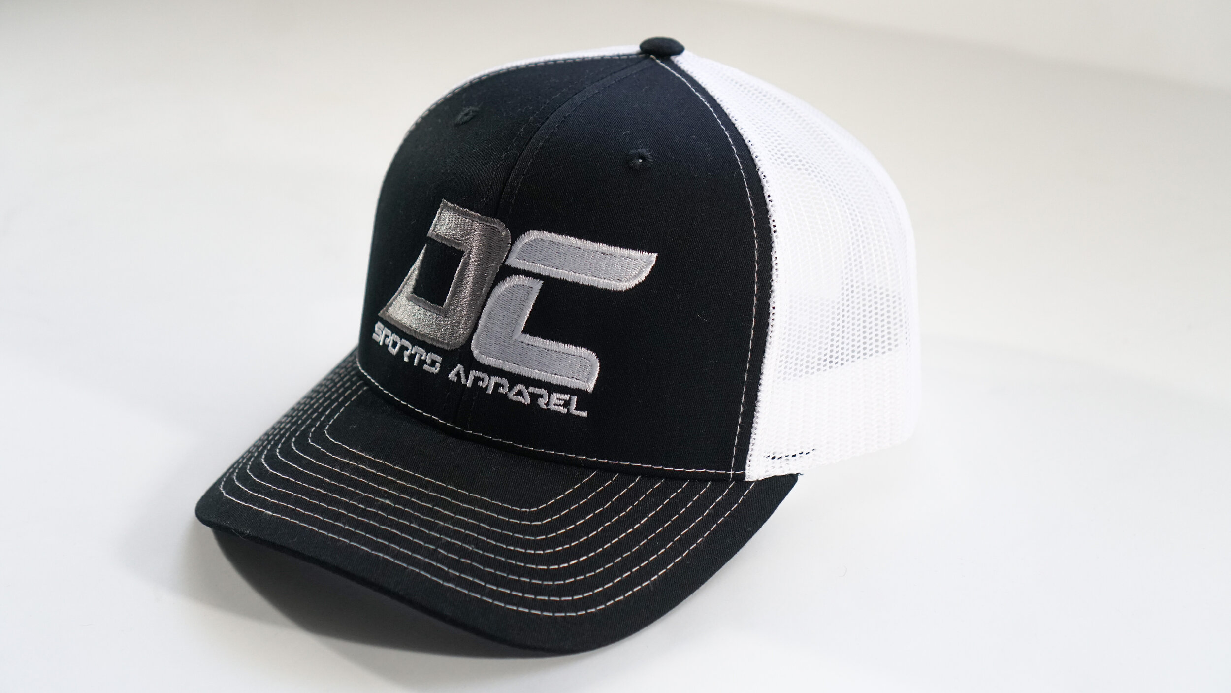 DC Sports Apparel Black/White Trucker SnapBack Hat — DC Sports Apparel