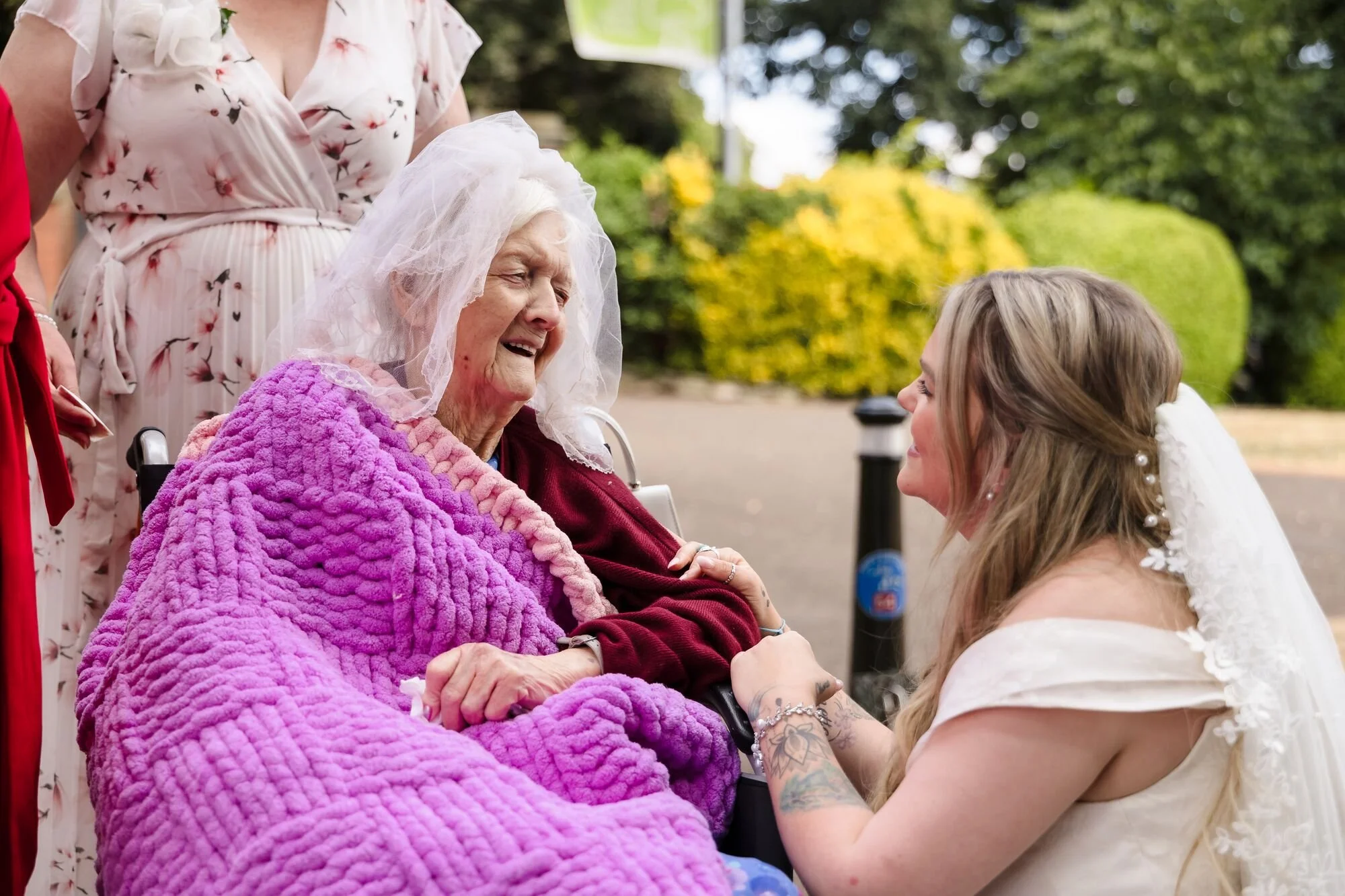 The bride beside her grandmother, who wears her own wedding veil, at Lichfield Registry Office, wedding photography by Once in a Lifetime Photography.
