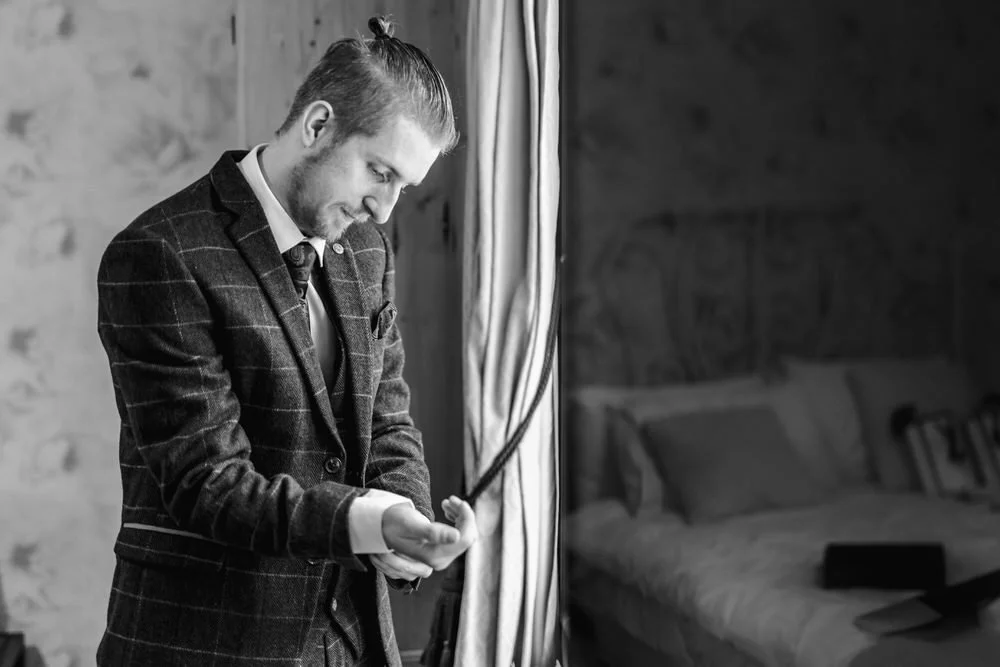 groom getting ready for the ceremony