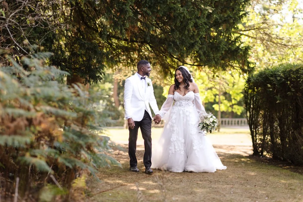 Romantic wedding portrait of bride and groom in the gardens of Hogarths Hotel Solihull.