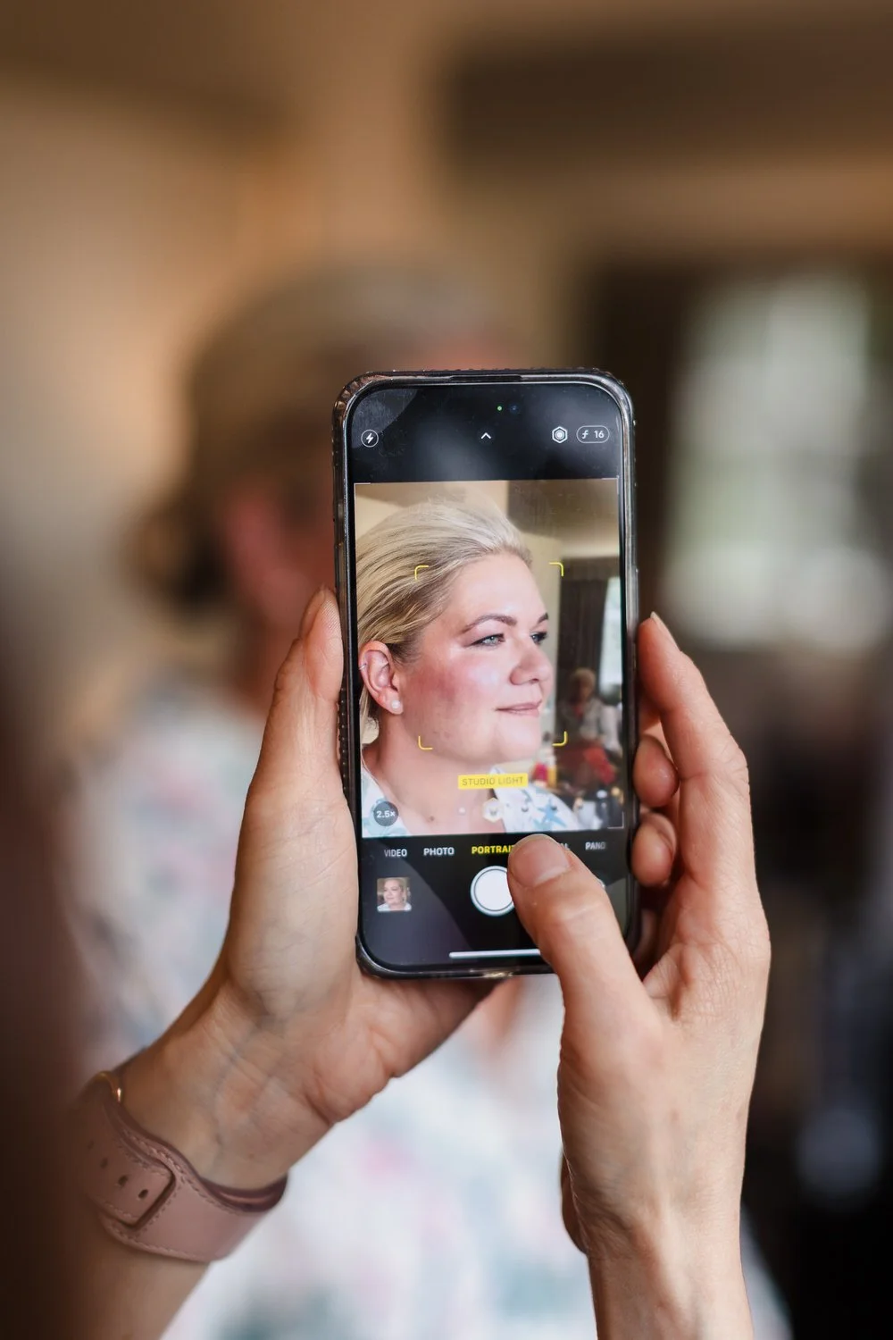 Bride Jess bridal preparations captured on phone during getting ready at Hogarths Stone Manor wedding, documentary photography