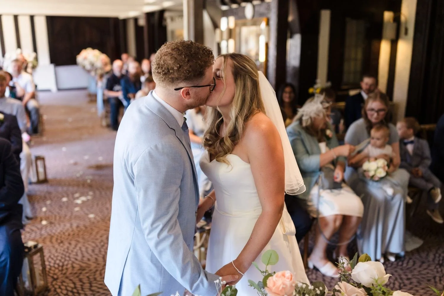 Cheryl and Josh's first kiss as a married couple in front of their guests in the Drawing Room