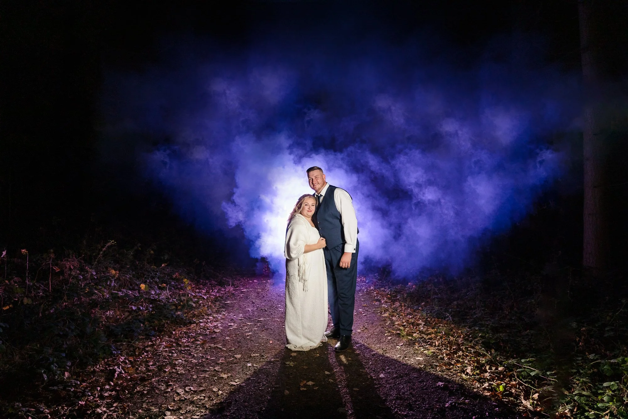 Bride and Groom photograpghed creatively outside the tipi wedding