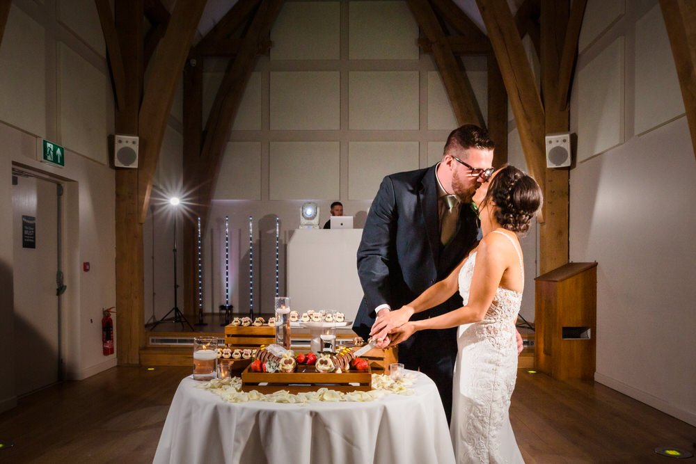 mill-barns-wedding-cake-cutting-moment.jpg