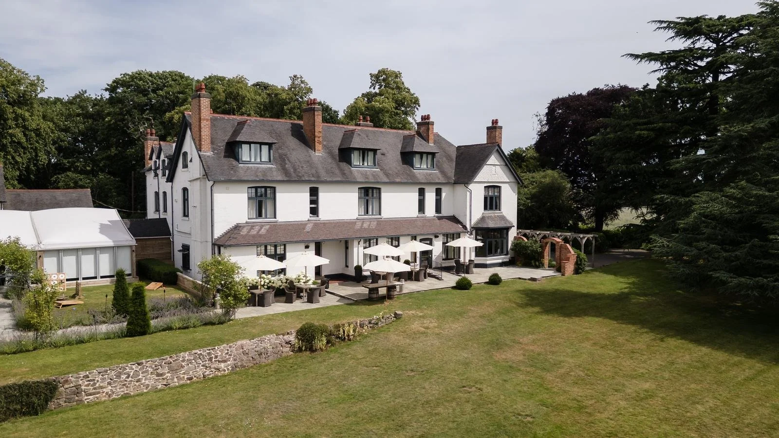 Country house exterior on the wedding morning at Ashton Lodge Country House wedding photography by Once in a Lifetime Photography