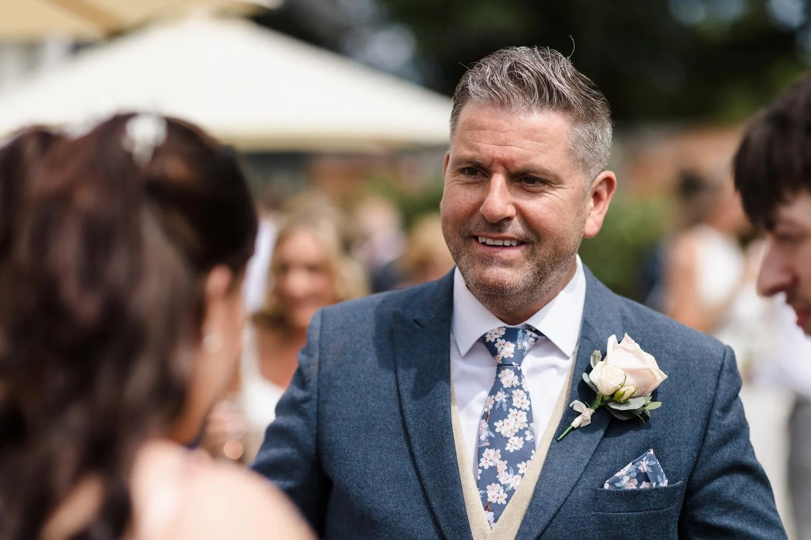 Close-up of Richard's reaction seeing Charlotte in the mirror at Ashton Lodge Country House wedding photography by Once in a Lifetime Photography