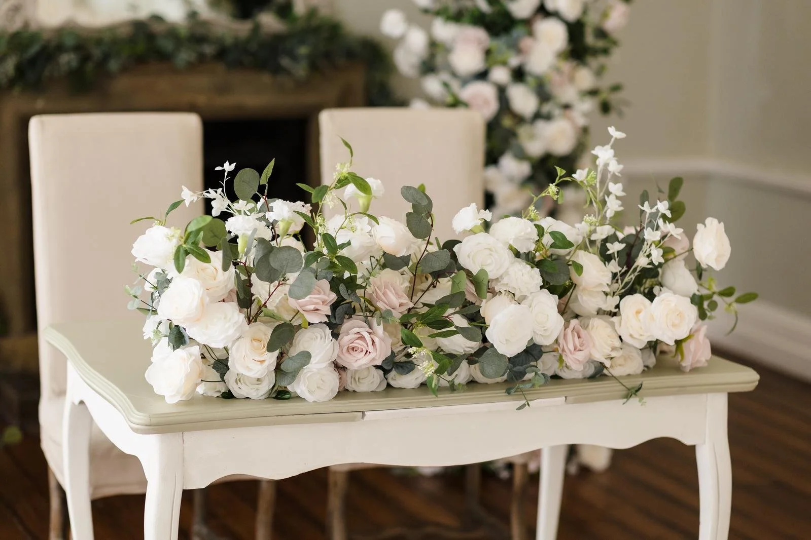 Welcome table florals at Ashton Lodge Country House wedding photography by Once in a Lifetime Photography