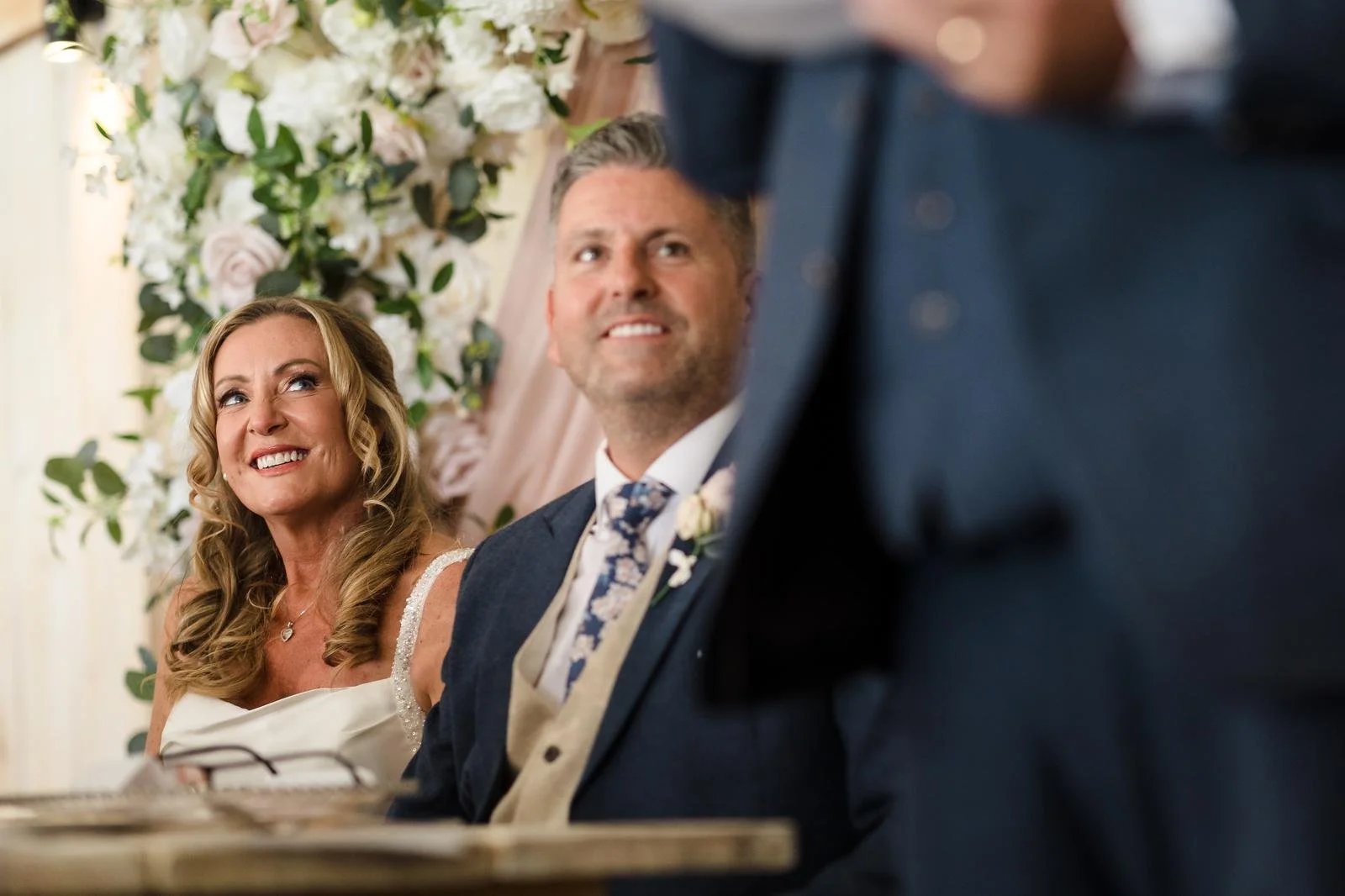 Guest laughing reaction during speeches at Ashton Lodge Country House wedding photography by Once in a Lifetime Photography