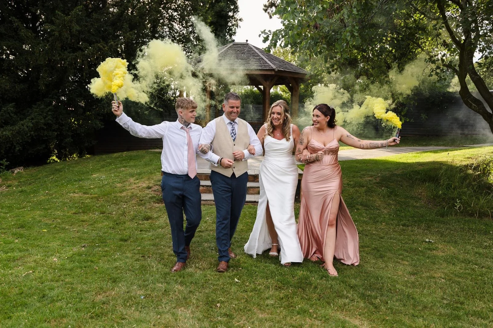 Smoke-bomb portrait with the walking group at Ashton Lodge Country House wedding photography by Once in a Lifetime Photography