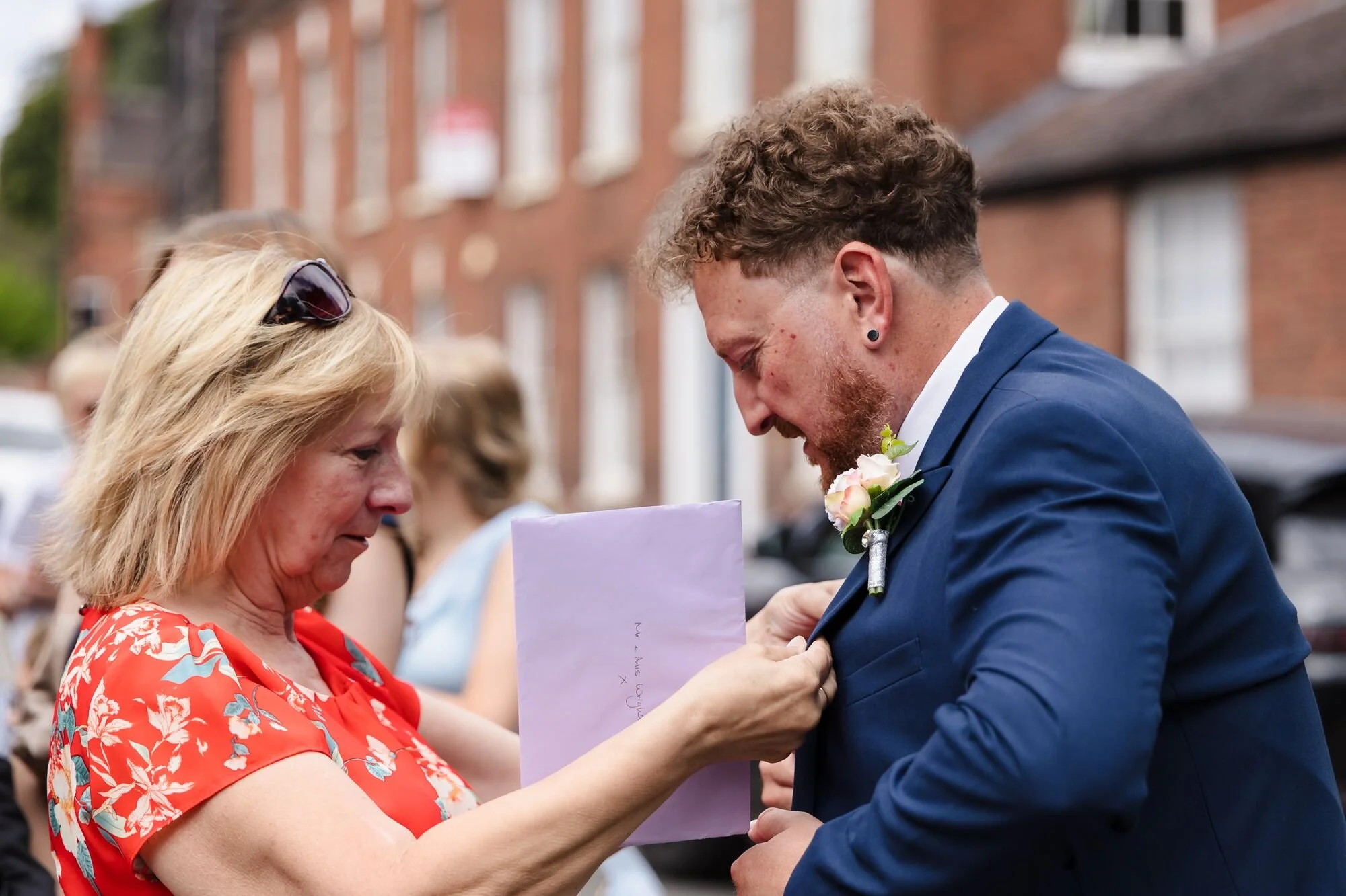 lichfield-registry-office-wedding-groom-buttonhole-pinned.jpg