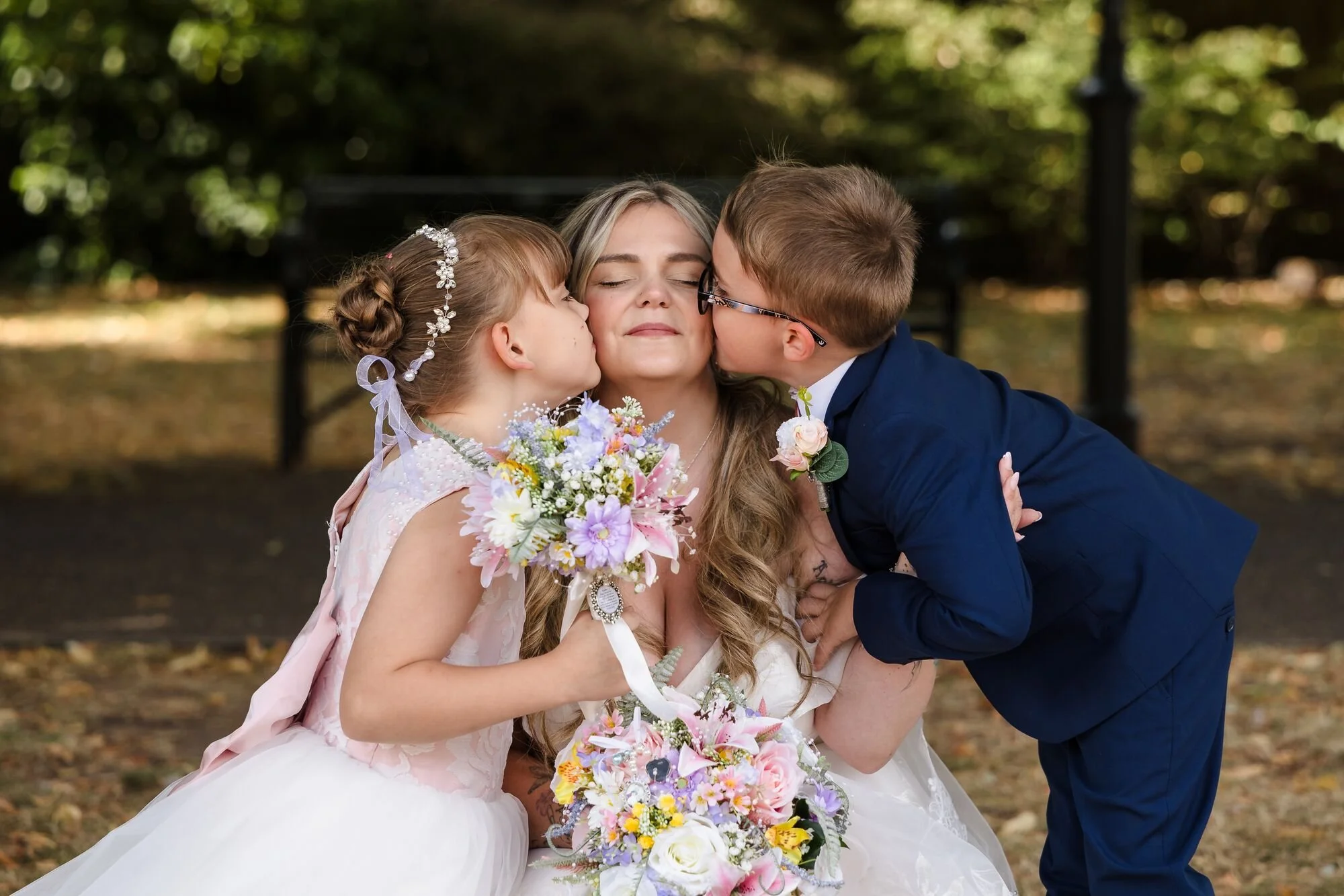 lichfield-registry-office-wedding-children-kiss-bride.jpg