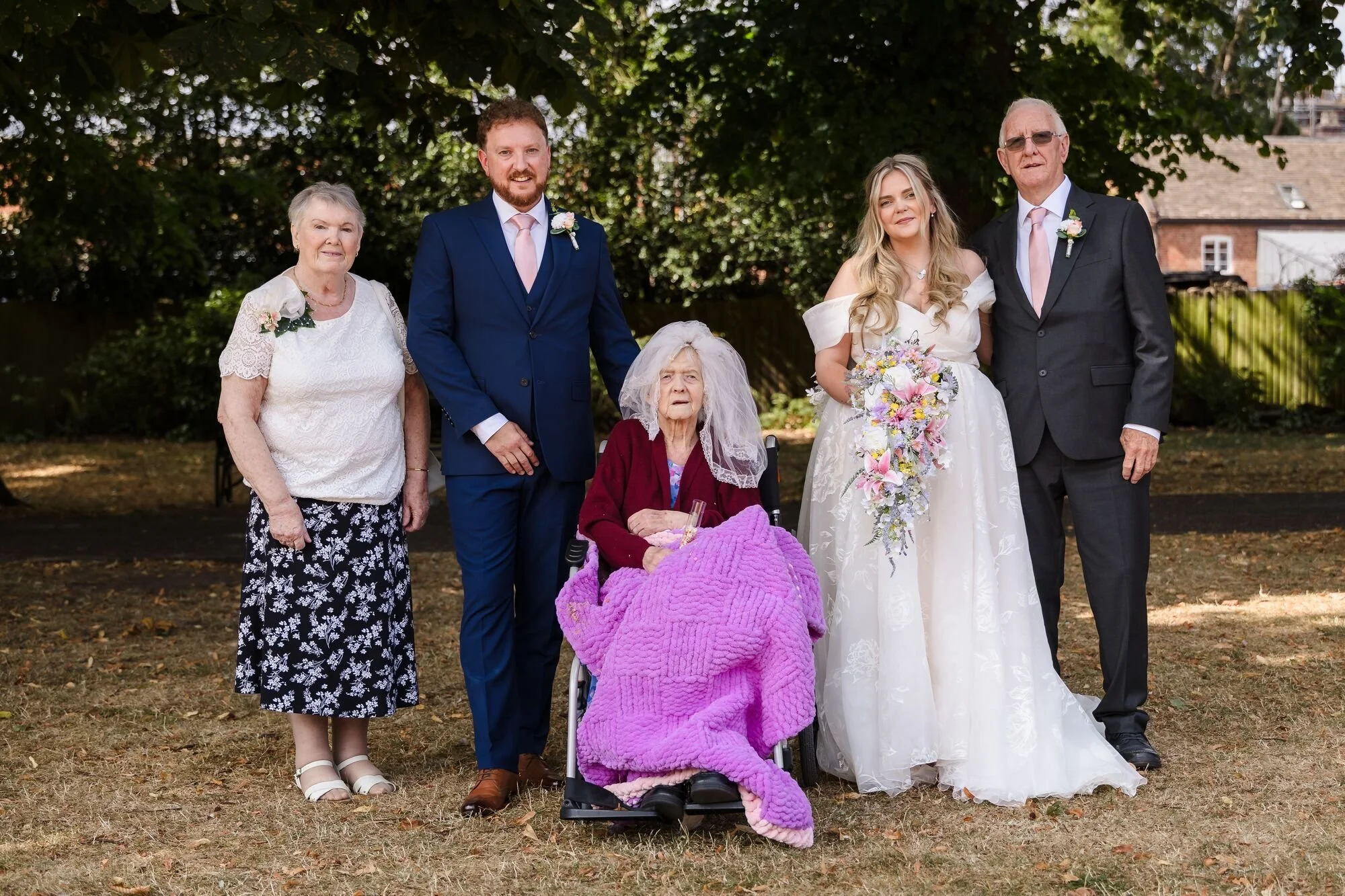 lichfield-registry-office-wedding-family-group-in-shade.jpg