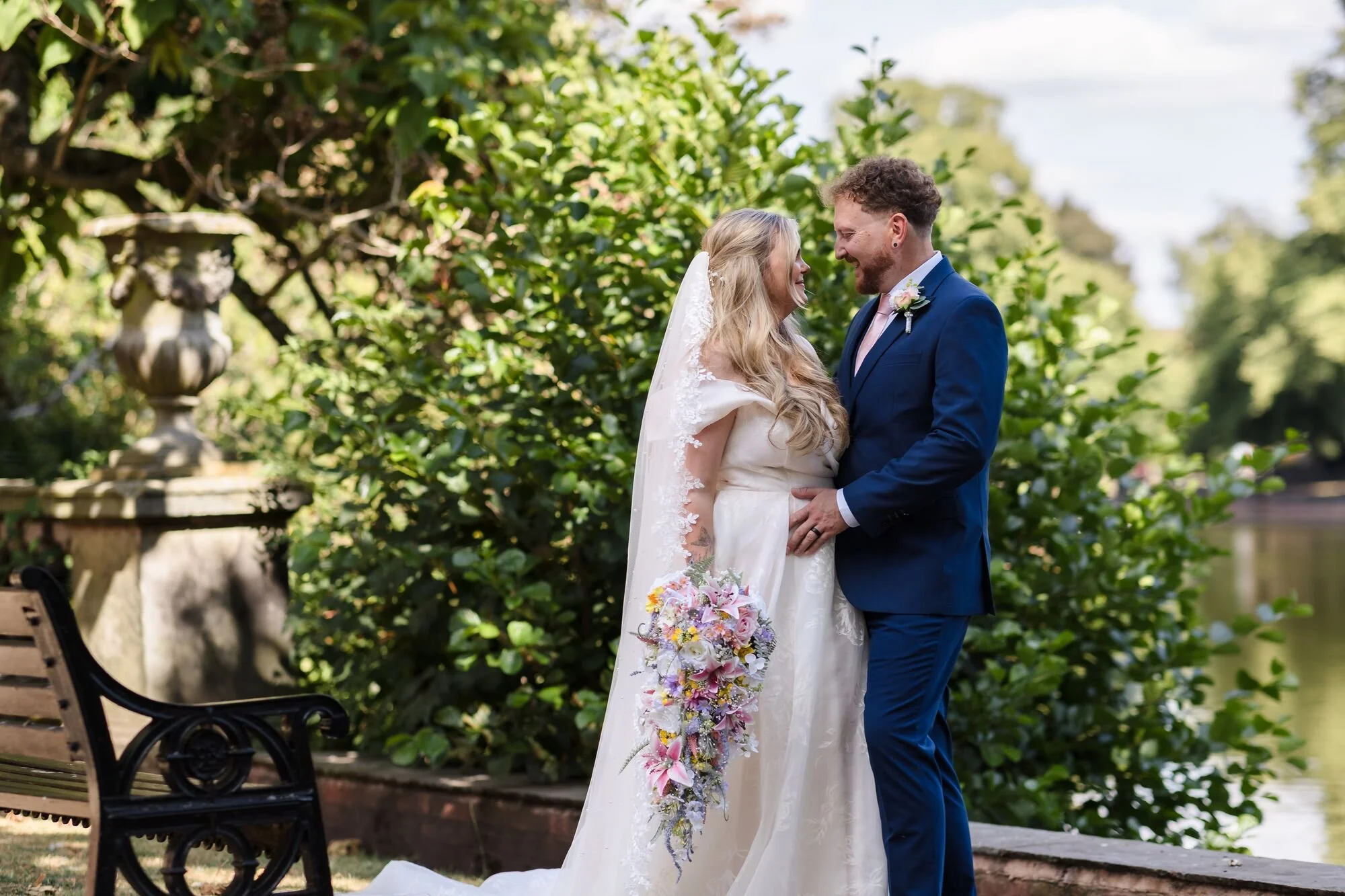 lichfield-wedding-photography-minster-pool-couple-laughing.jpg