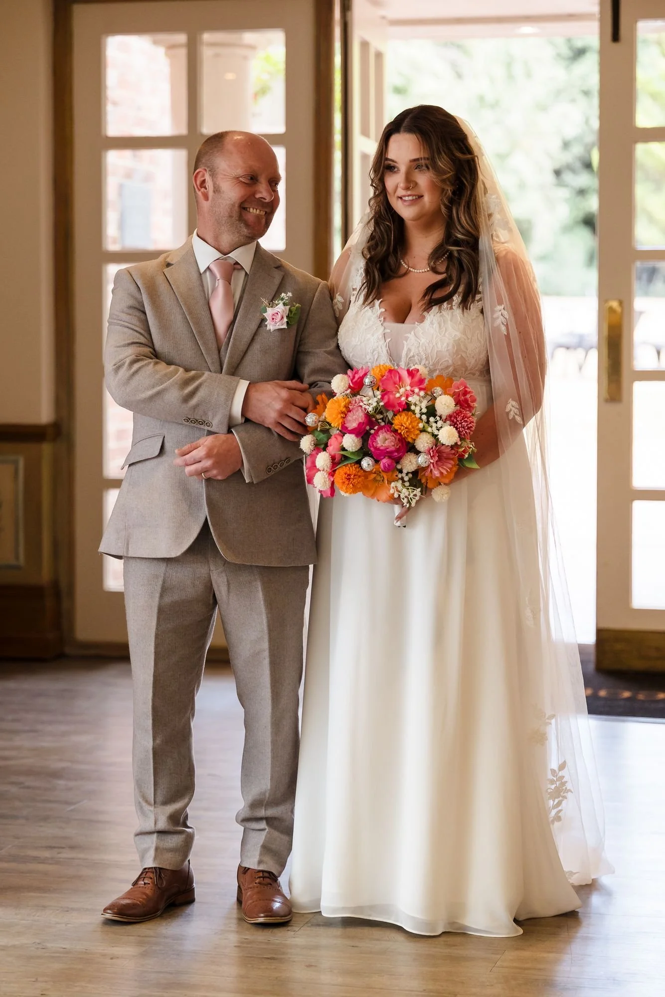 bride-holly-and-dad-waiting-to-walk-down-aisle.jpg