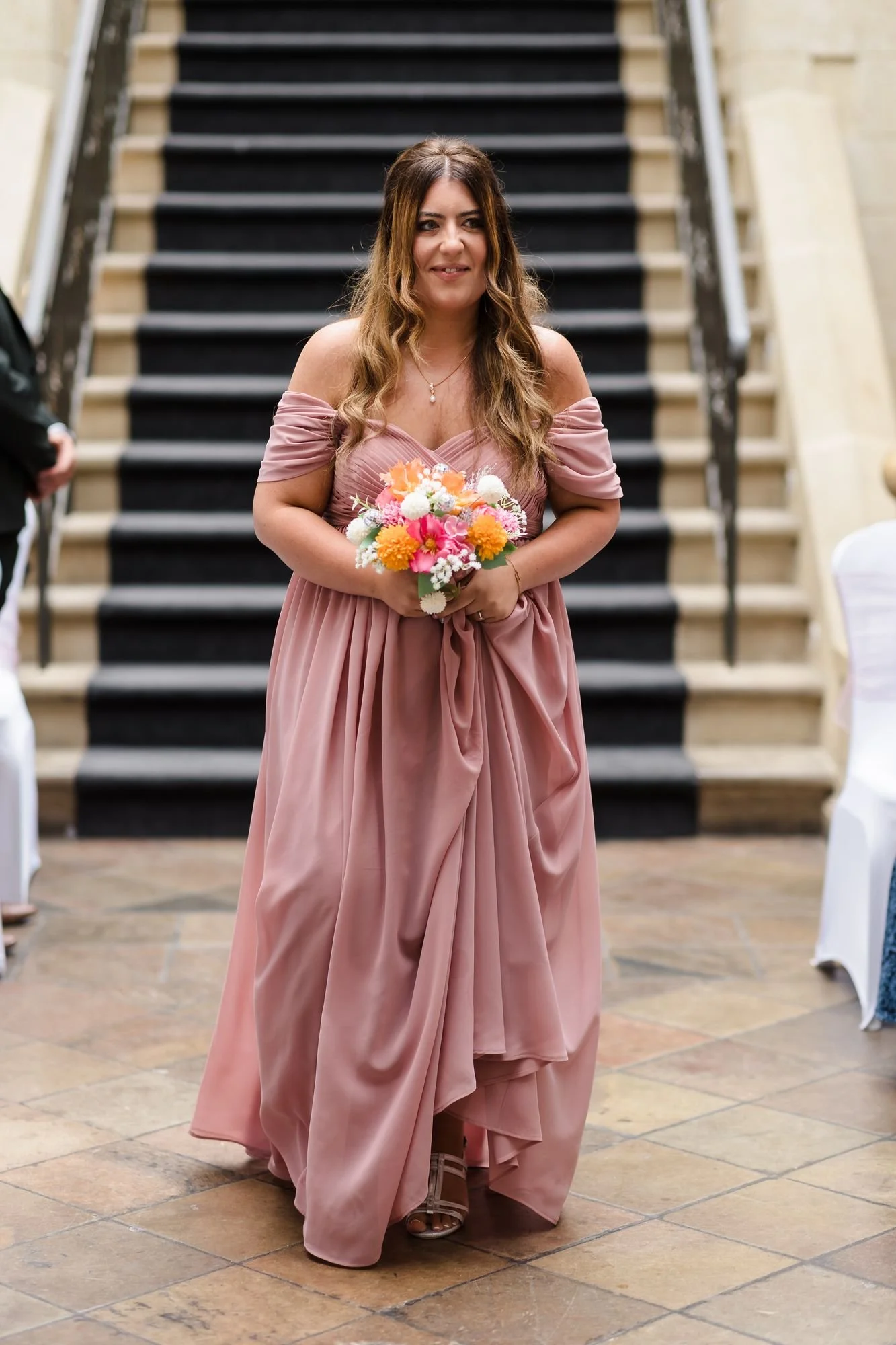 bridesmaid-walking-down-aisle-nailcote-hall.jpg