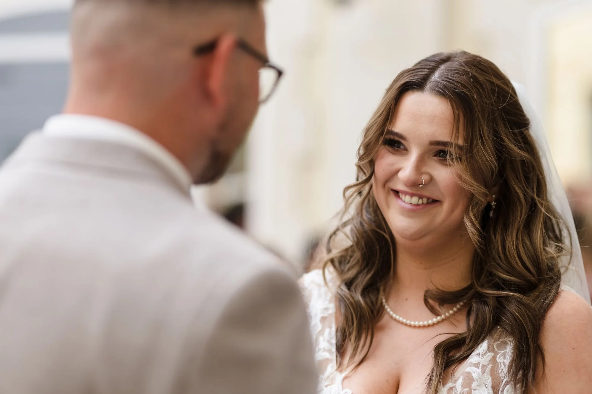bride-holly-smiling-at-groom-during-vows.jpg