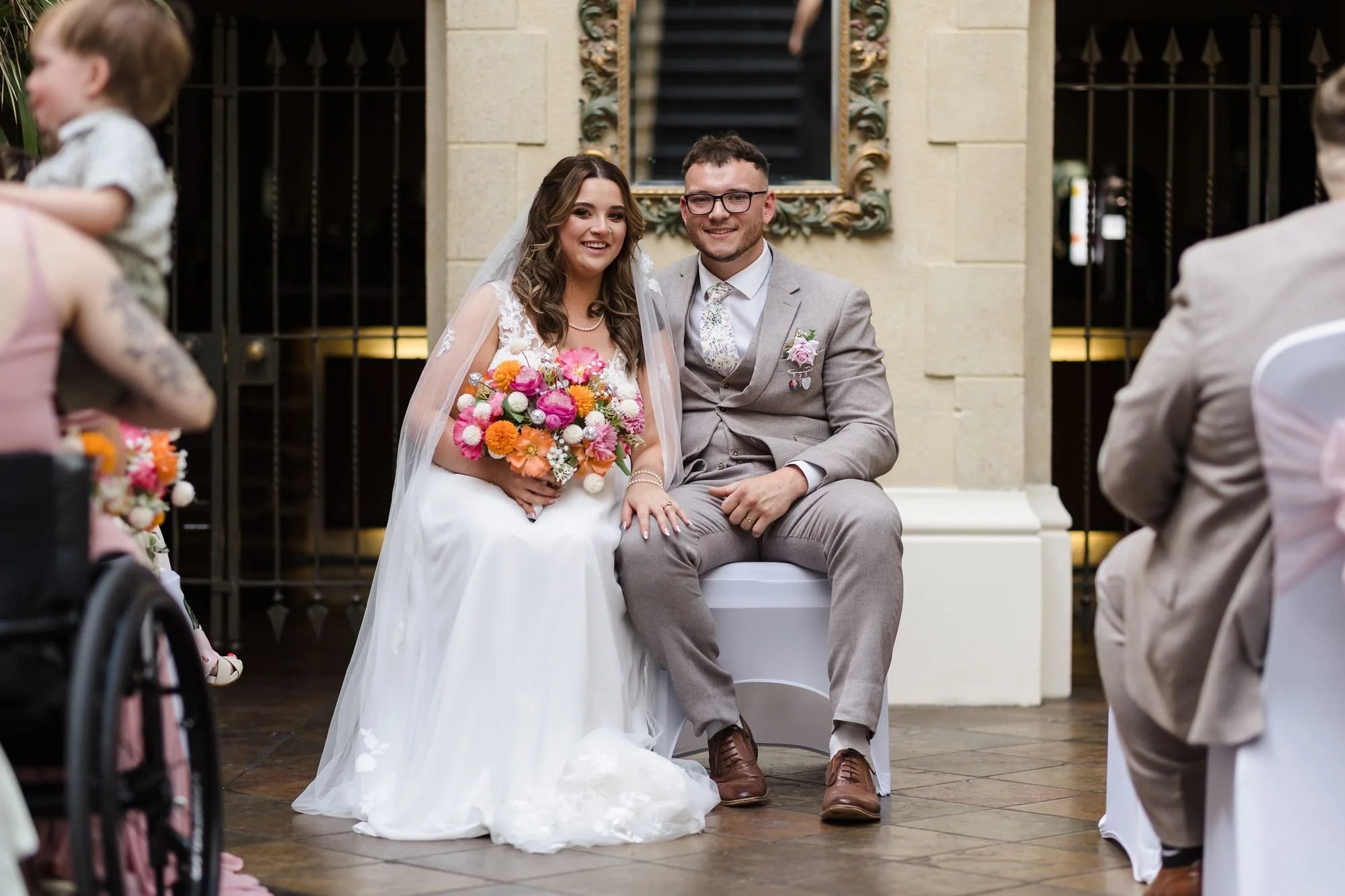 holly-and-dan-seated-during-ceremony-nailcote-hall.jpg