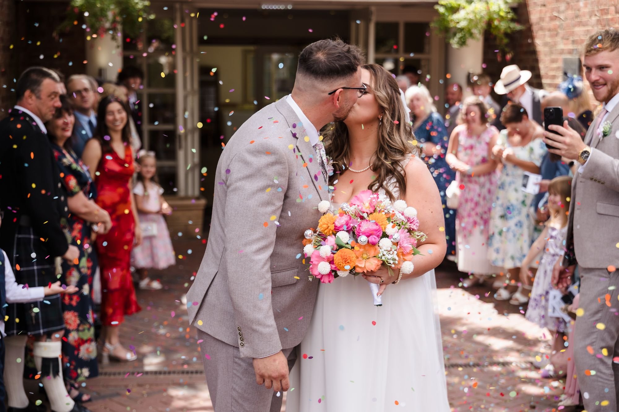 holly-and-dan-confetti-kiss-nailcote-hall.jpg