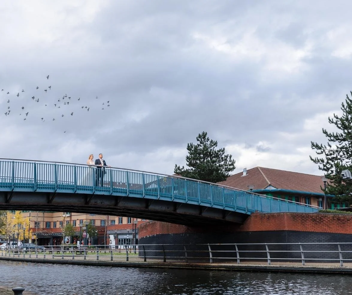 Bride and groom on then bridge near Copthorne hotel dudley