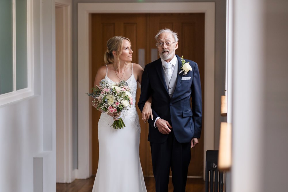 Emotional father-daughter moment before Bredenbury Court wedding ceremony in Herefordshire