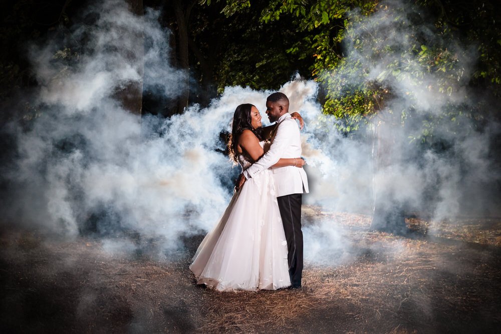 Smoke bomb wedding photography in woodland setting — couple portraits by Paul Hickey, Once in a Lifetime Photography, Worcestershire