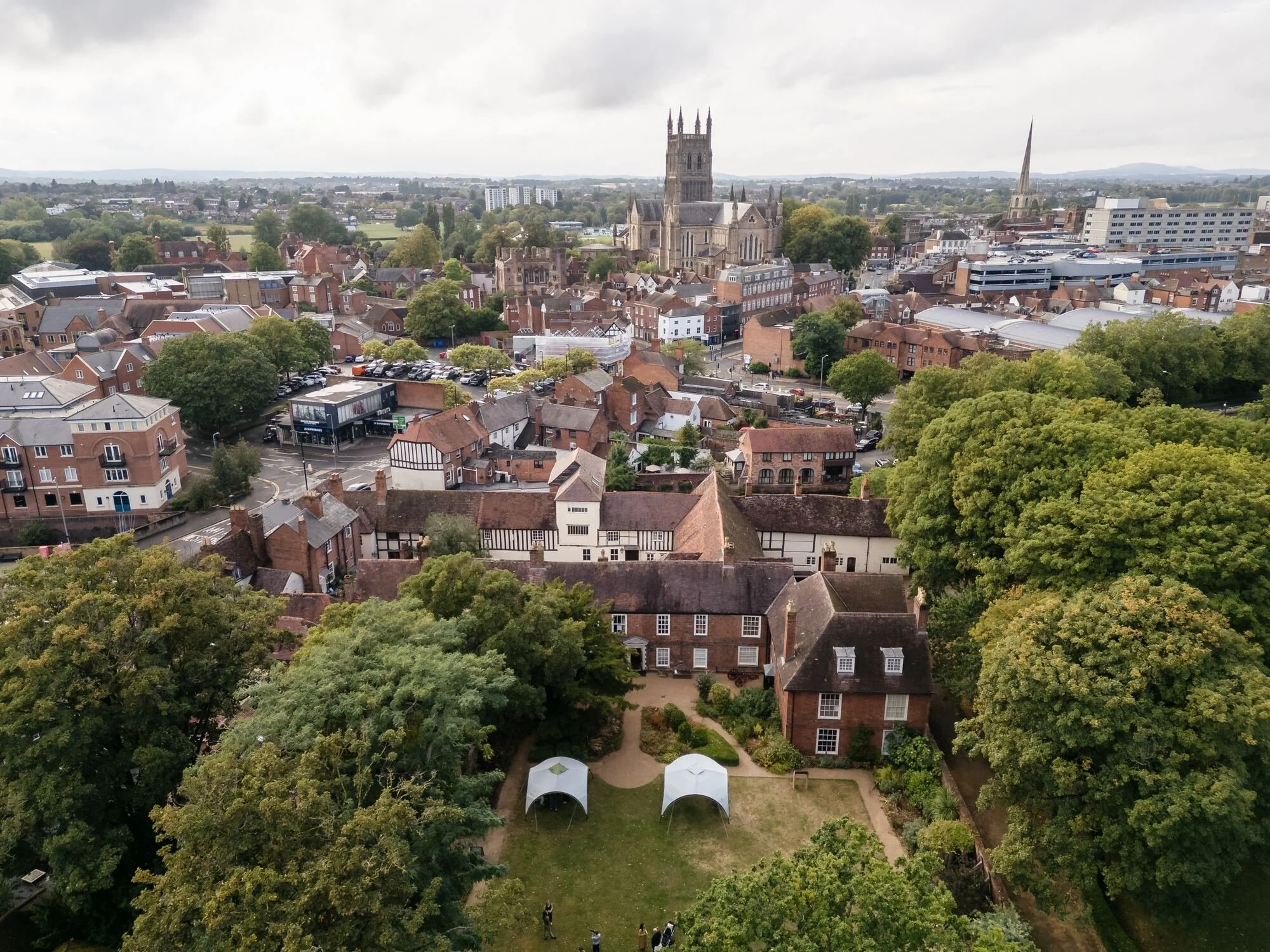 Aerial drone view of The Commandery and its walled garden with Worcester Cathedral on the skyline, by Once in a Lifetime Photography