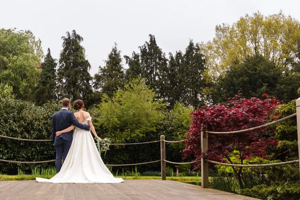 Bride and groom arm in arm at wedding in worcestershire