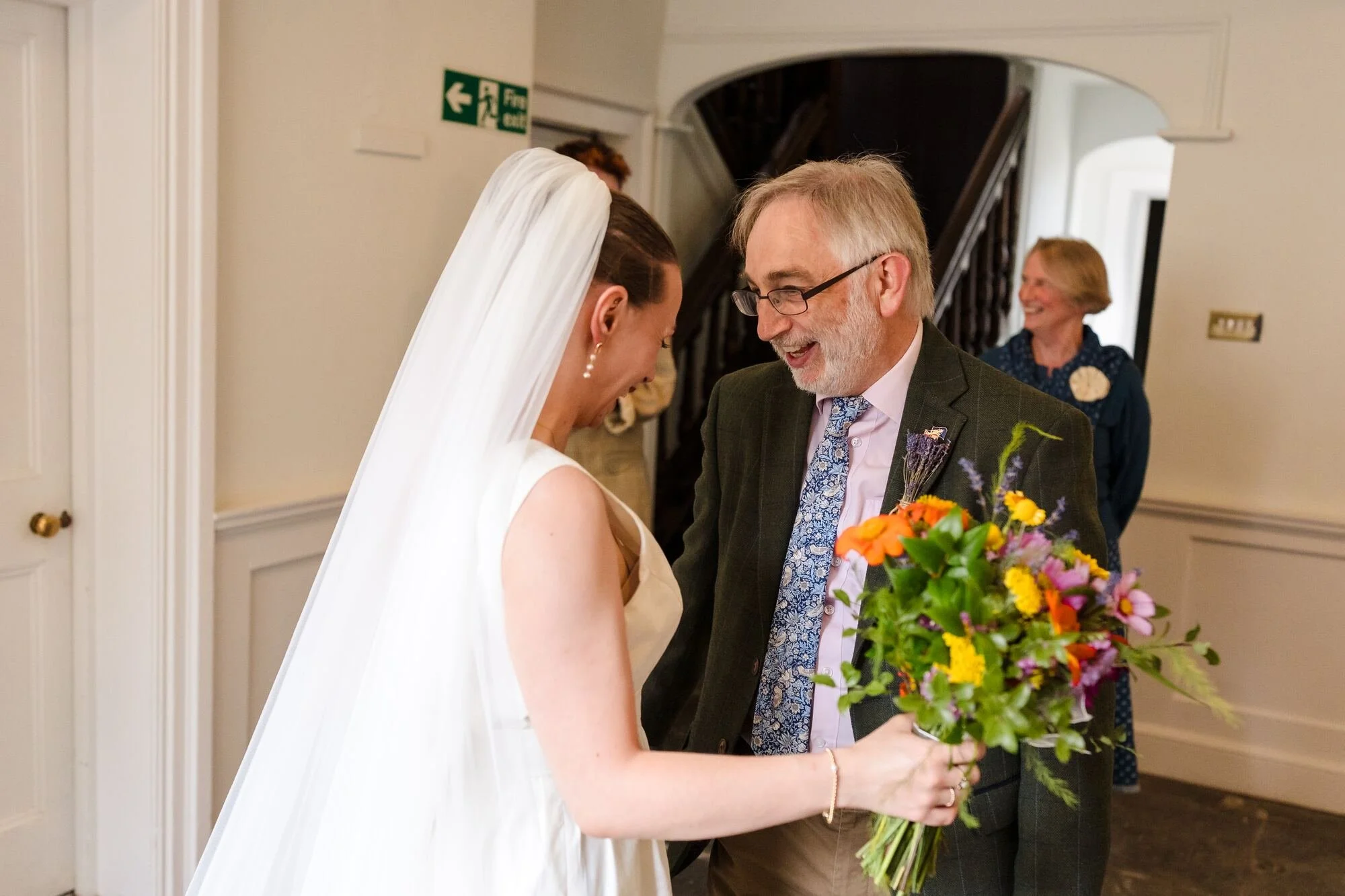Isabelle sharing a quiet first look with her father before her wedding at The Commandery, Worcester, by Once in a Lifetime Photography