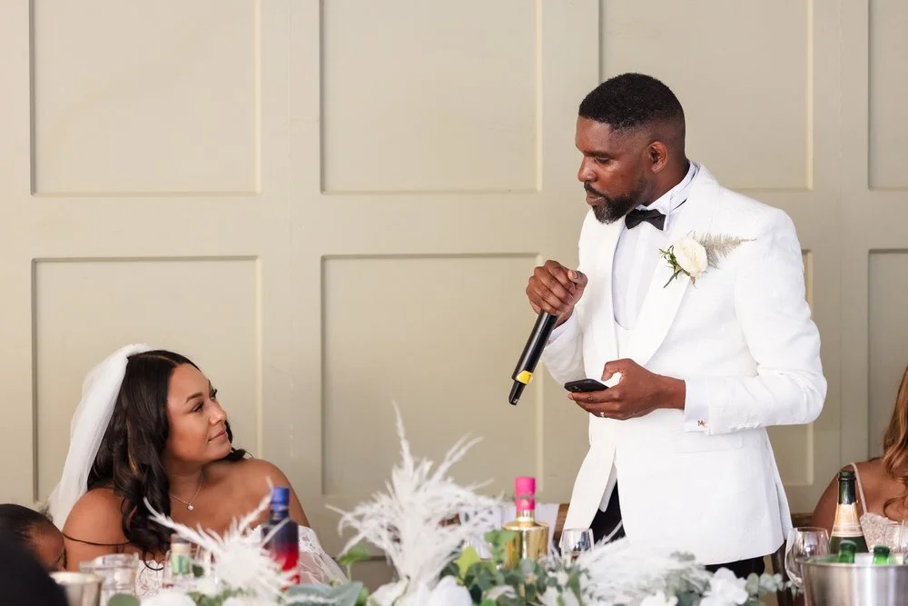 Groom giving a wedding speech during the reception at Hogarths Hotel wedding venue.