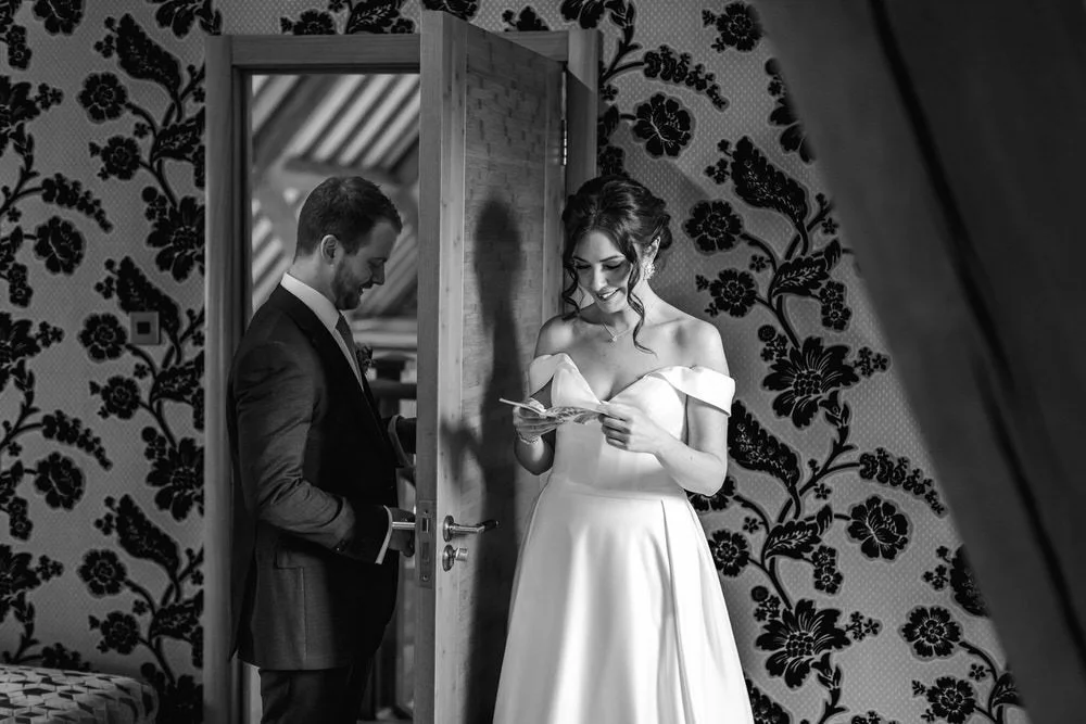 Bride and groom sharing some private vows before a wedding ceremony